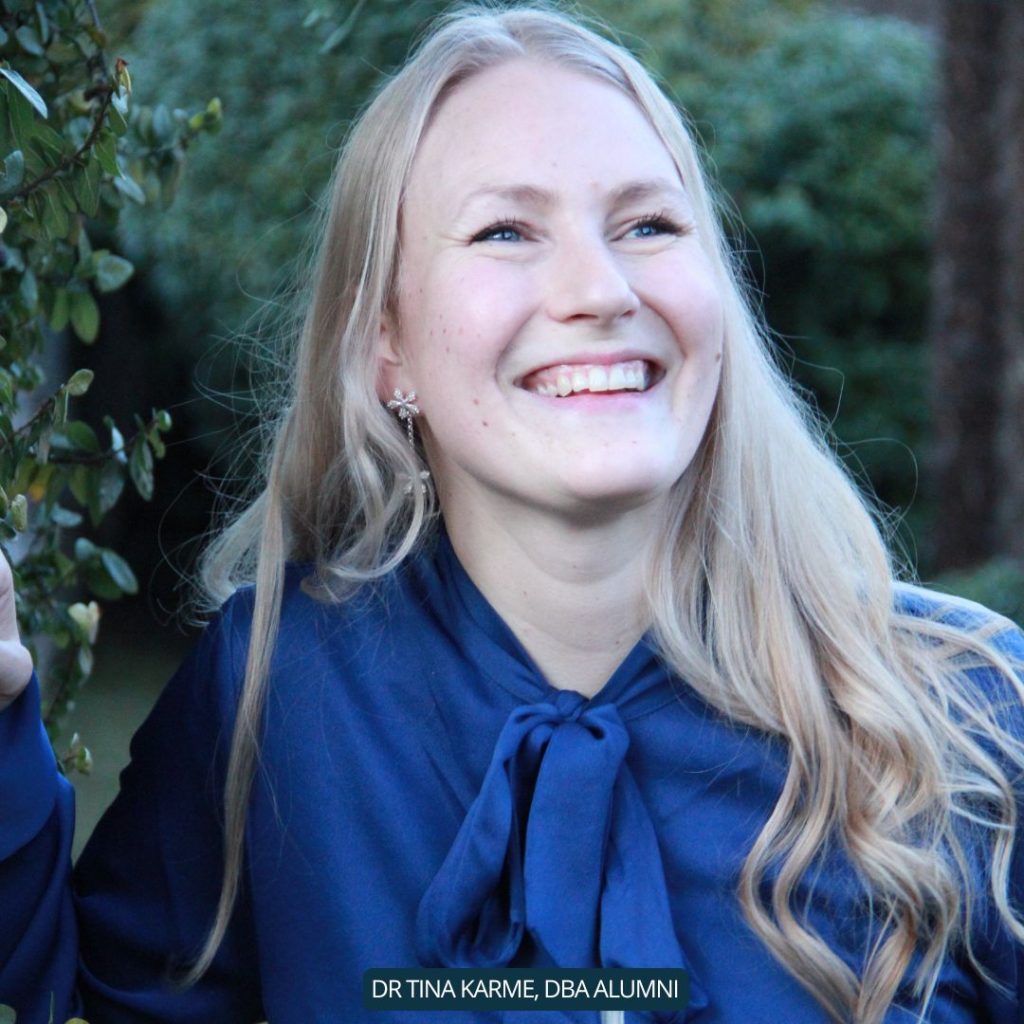 Dr. Tina, a smiling DBA alumna from EBU, representing the success and achievements of graduates from the Doctor of Business Administration program.